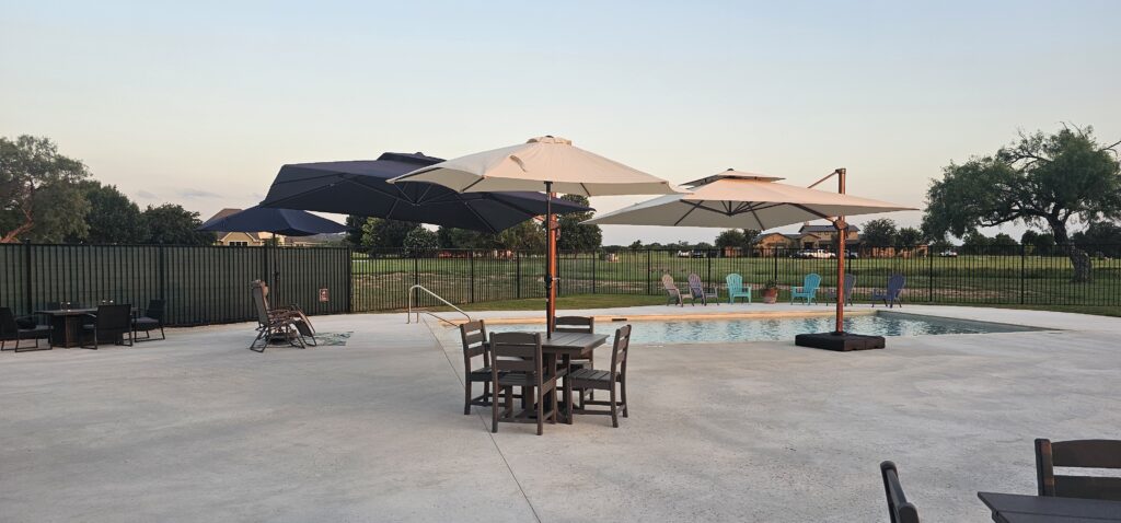 Poolside lounge area at Legends Golf Course, perfect for guys golf trip