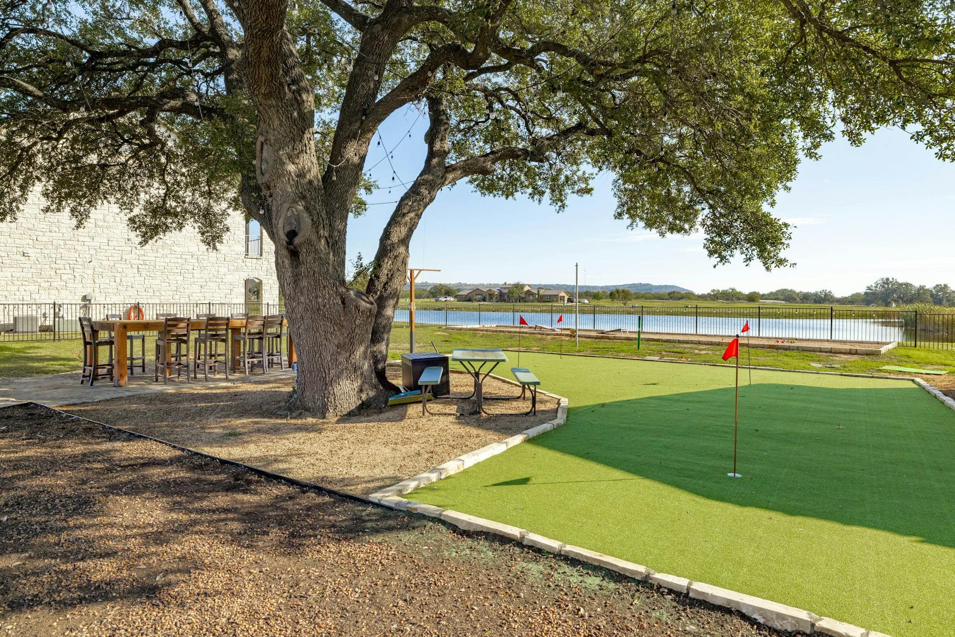 outdoor dining and recreation area at legends golf course and villas on lake LBJ