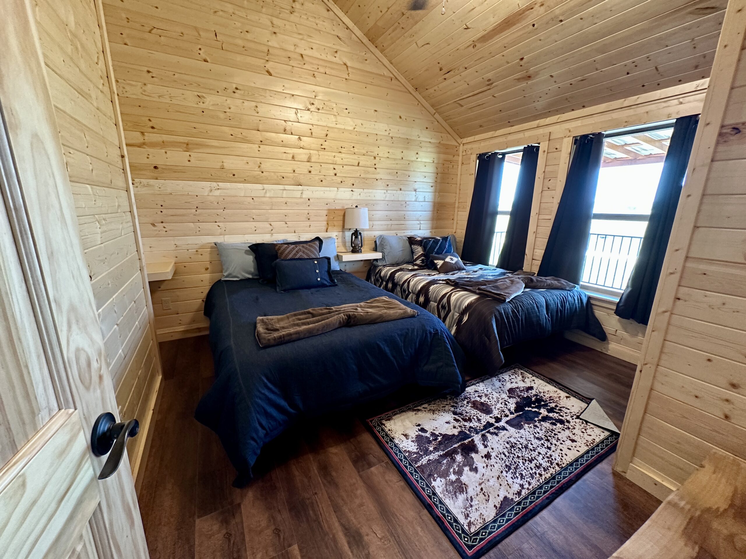 Bedroom 1 at Longhorn Cabin Stay and Play Option at Legends Golf Course near Austin Bedroom 1 at Longhorn Cabin Stay and Play Option at Legends Golf Course near Austin